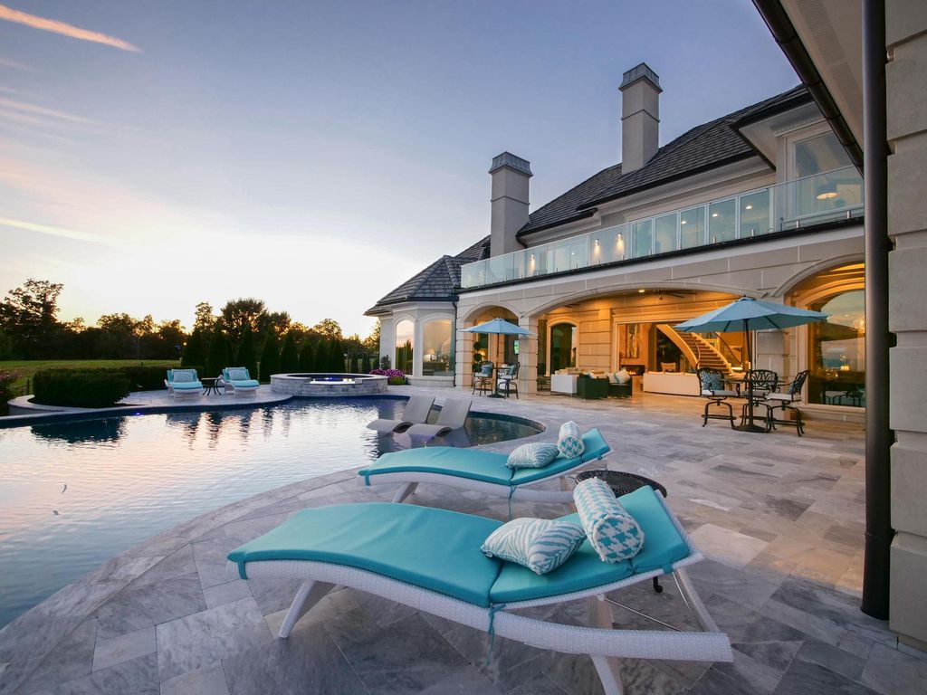 12768 Highwick Circle Home in Knoxville, Tennessee. Explore the epitome of luxury living at this architectural masterpiece nestled in prestigious Bridgemore. Perched atop Farragut's highest point, this one-of-a-kind home offers breathtaking views of the mountains and lake. 