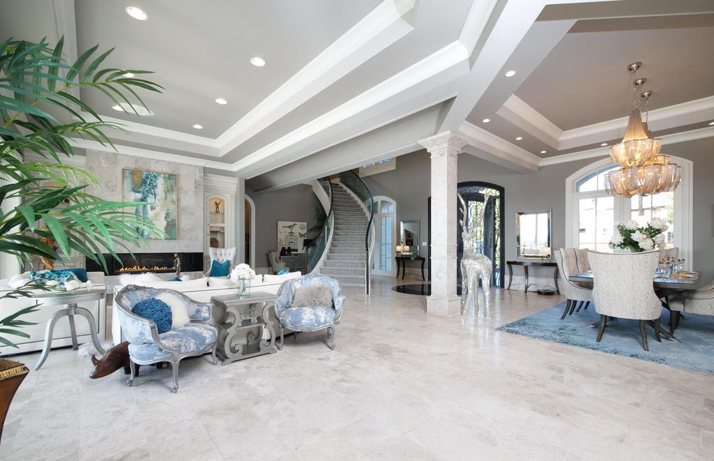 12768 Highwick Circle Home in Knoxville, Tennessee. Explore the epitome of luxury living at this architectural masterpiece nestled in prestigious Bridgemore. Perched atop Farragut's highest point, this one-of-a-kind home offers breathtaking views of the mountains and lake. 