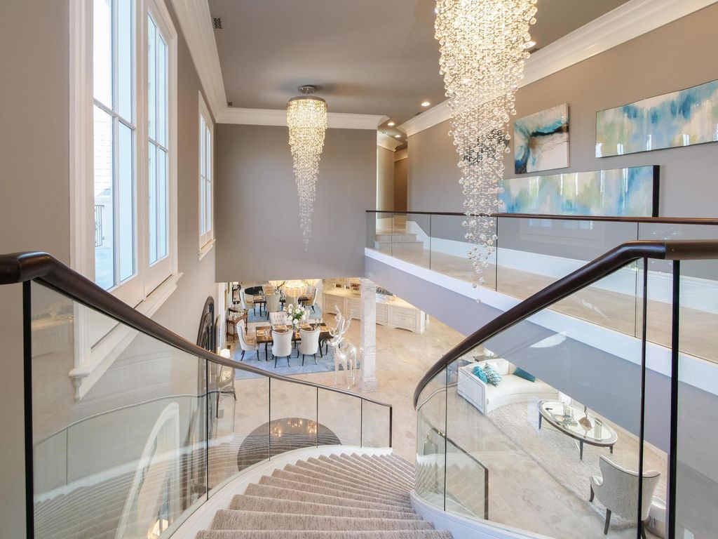 12768 Highwick Circle Home in Knoxville, Tennessee. Explore the epitome of luxury living at this architectural masterpiece nestled in prestigious Bridgemore. Perched atop Farragut's highest point, this one-of-a-kind home offers breathtaking views of the mountains and lake. 