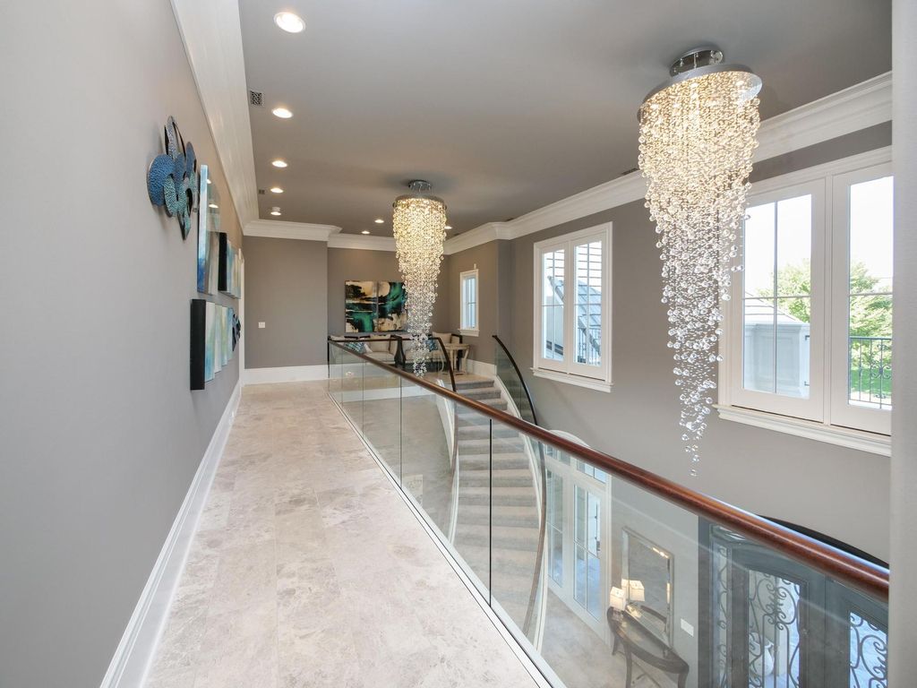 12768 Highwick Circle Home in Knoxville, Tennessee. Explore the epitome of luxury living at this architectural masterpiece nestled in prestigious Bridgemore. Perched atop Farragut's highest point, this one-of-a-kind home offers breathtaking views of the mountains and lake. 