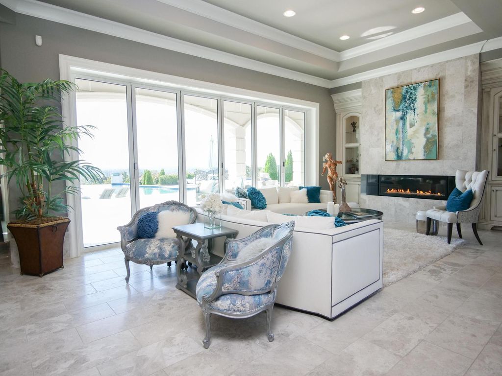 12768 Highwick Circle Home in Knoxville, Tennessee. Explore the epitome of luxury living at this architectural masterpiece nestled in prestigious Bridgemore. Perched atop Farragut's highest point, this one-of-a-kind home offers breathtaking views of the mountains and lake. 