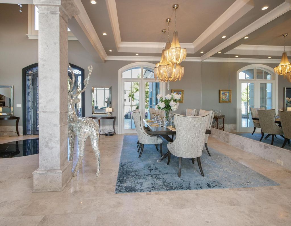 12768 Highwick Circle Home in Knoxville, Tennessee. Explore the epitome of luxury living at this architectural masterpiece nestled in prestigious Bridgemore. Perched atop Farragut's highest point, this one-of-a-kind home offers breathtaking views of the mountains and lake. 