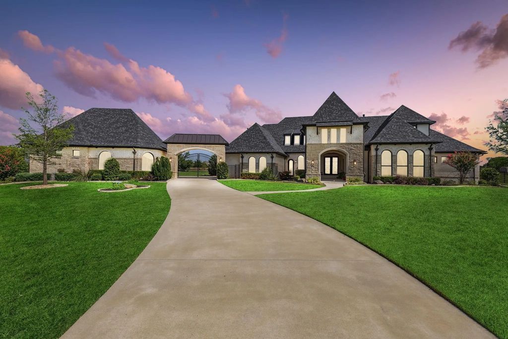 1621 Jan Marie Drive Home in Lucas, Texas. Discover unparalleled luxury in this custom J. Anthony home quietly nestled on a 2-acre north-facing cul-de-sac in prestigious Lovejoy ISD. Featuring exceptional design, premium fixtures, and abundant natural light, this home offers an open concept living area with exposed beams and a gourmet kitchen with dual islands and quartz countertops.