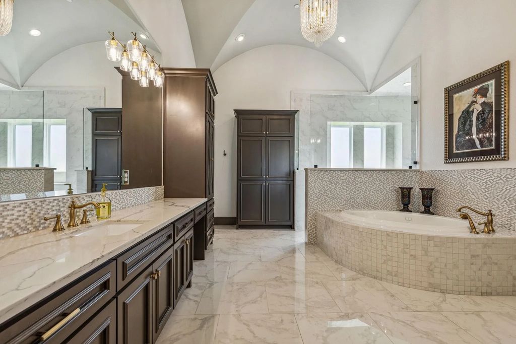 1621 Jan Marie Drive Home in Lucas, Texas. Discover unparalleled luxury in this custom J. Anthony home quietly nestled on a 2-acre north-facing cul-de-sac in prestigious Lovejoy ISD. Featuring exceptional design, premium fixtures, and abundant natural light, this home offers an open concept living area with exposed beams and a gourmet kitchen with dual islands and quartz countertops.