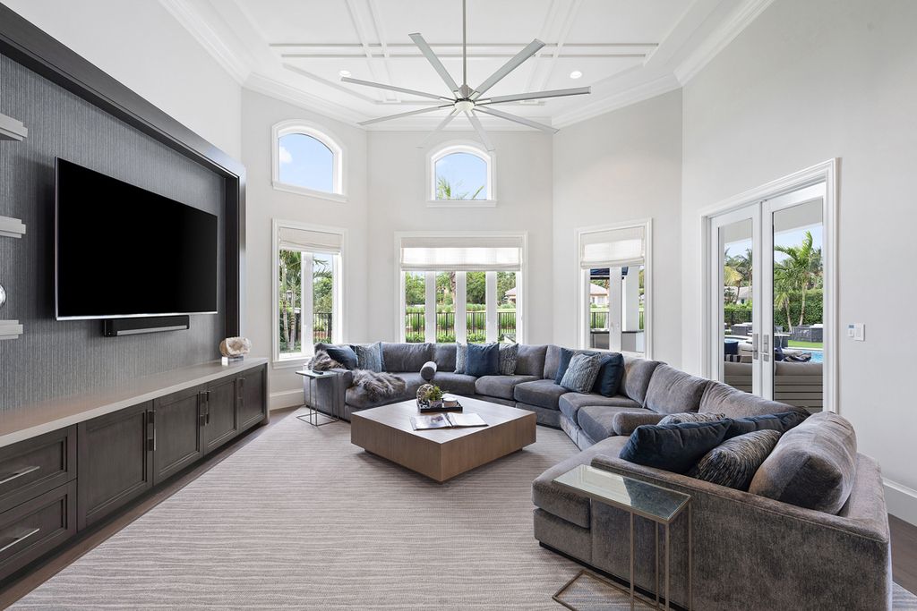 311 Fan Palm Road Home in Boca Raton, Florida. Discover contemporary elegance in this 5-bedroom golf course home at 311 Fan Palm Road, meticulously renovated to showcase brand new construction. Located in the esteemed Royal Palm Yacht & Country Club.