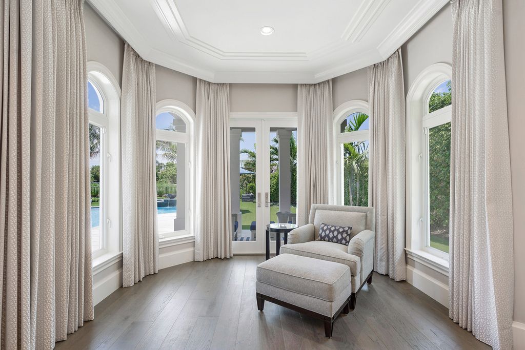 311 Fan Palm Road Home in Boca Raton, Florida. Discover contemporary elegance in this 5-bedroom golf course home at 311 Fan Palm Road, meticulously renovated to showcase brand new construction. Located in the esteemed Royal Palm Yacht & Country Club.