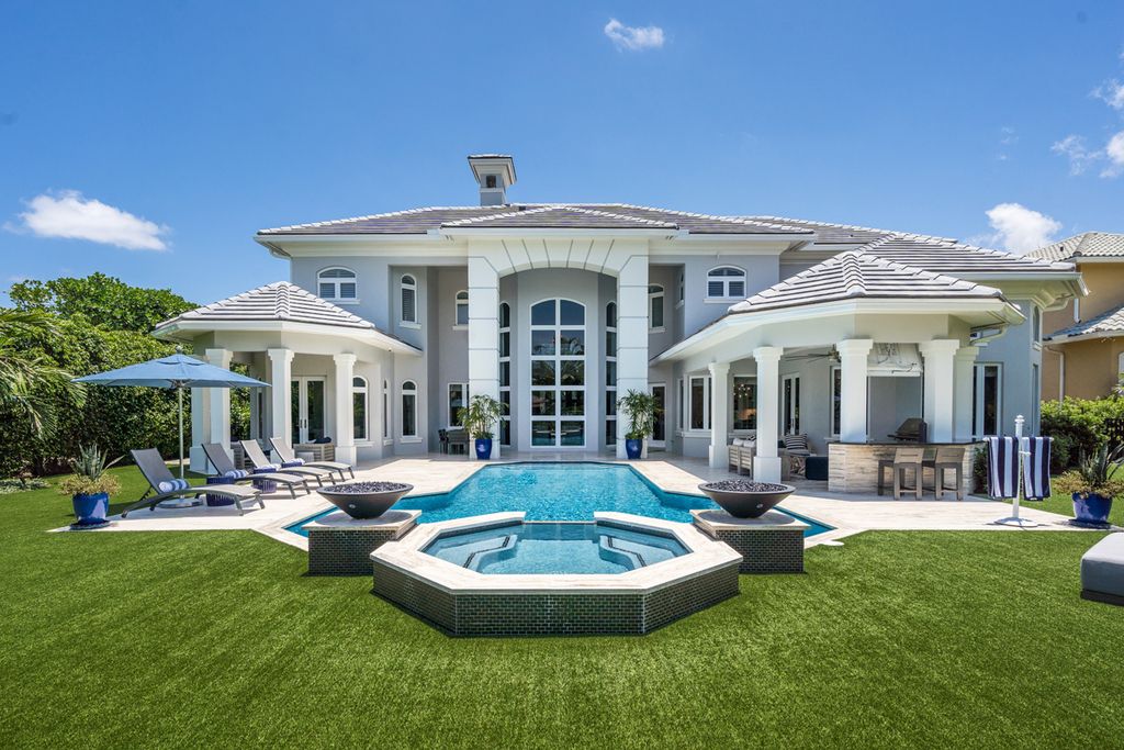 311 Fan Palm Road Home in Boca Raton, Florida. Discover contemporary elegance in this 5-bedroom golf course home at 311 Fan Palm Road, meticulously renovated to showcase brand new construction. Located in the esteemed Royal Palm Yacht & Country Club.
