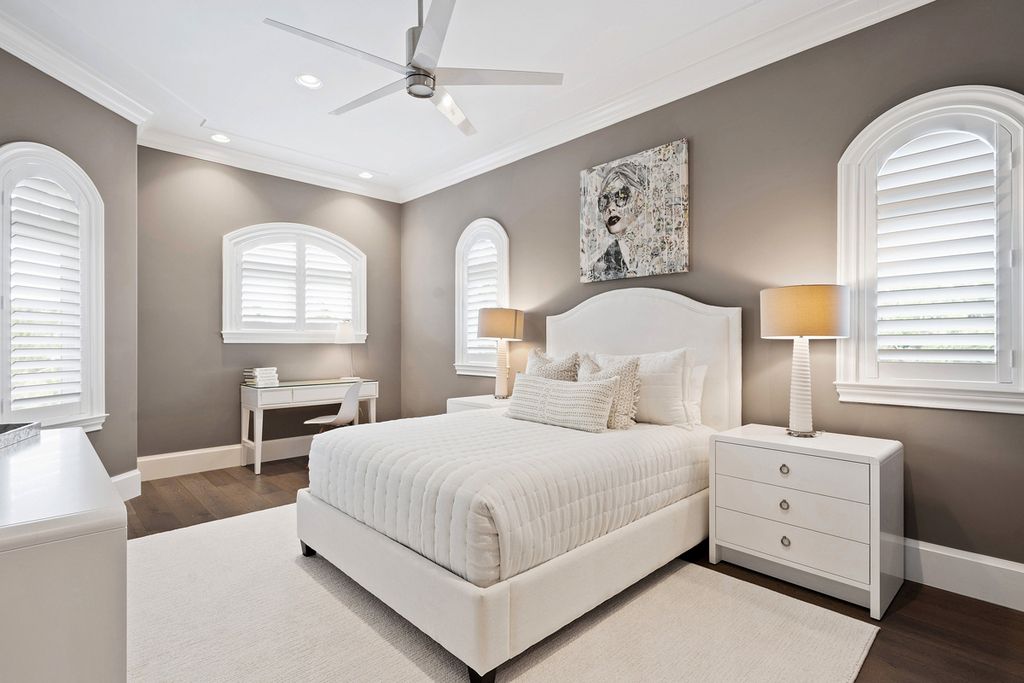 311 Fan Palm Road Home in Boca Raton, Florida. Discover contemporary elegance in this 5-bedroom golf course home at 311 Fan Palm Road, meticulously renovated to showcase brand new construction. Located in the esteemed Royal Palm Yacht & Country Club.