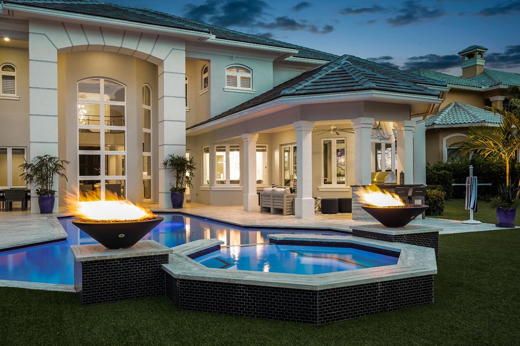 311 Fan Palm Road Home in Boca Raton, Florida. Discover contemporary elegance in this 5-bedroom golf course home at 311 Fan Palm Road, meticulously renovated to showcase brand new construction. Located in the esteemed Royal Palm Yacht & Country Club.