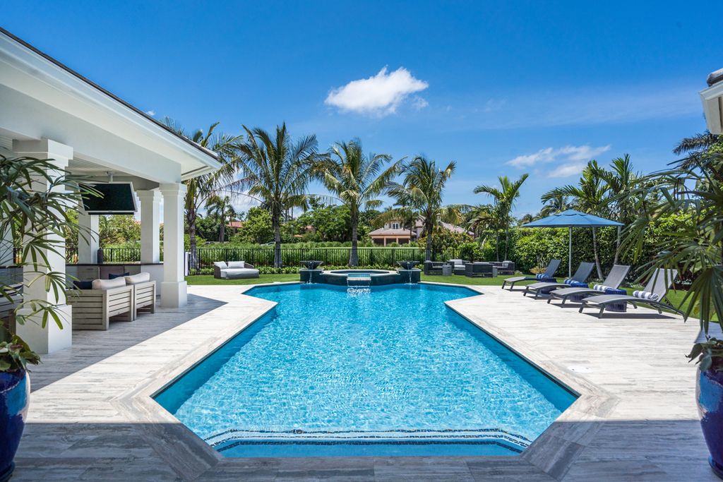 311 Fan Palm Road Home in Boca Raton, Florida. Discover contemporary elegance in this 5-bedroom golf course home at 311 Fan Palm Road, meticulously renovated to showcase brand new construction. Located in the esteemed Royal Palm Yacht & Country Club.