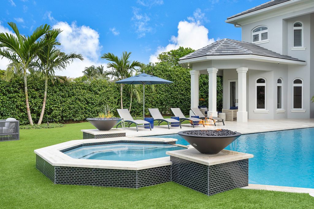 311 Fan Palm Road Home in Boca Raton, Florida. Discover contemporary elegance in this 5-bedroom golf course home at 311 Fan Palm Road, meticulously renovated to showcase brand new construction. Located in the esteemed Royal Palm Yacht & Country Club.