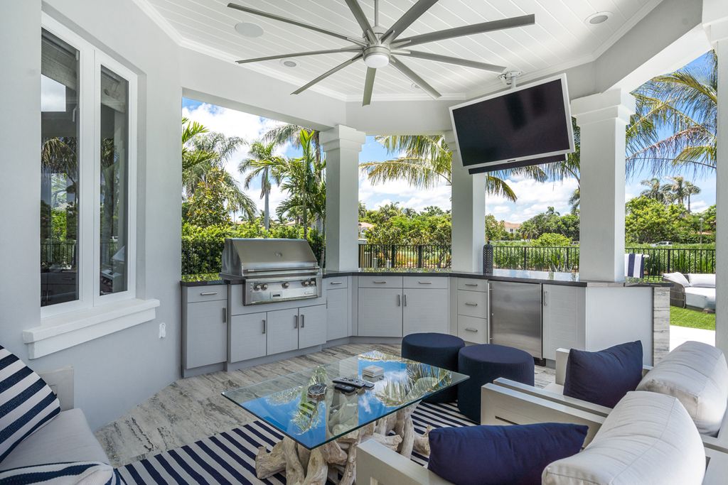 311 Fan Palm Road Home in Boca Raton, Florida. Discover contemporary elegance in this 5-bedroom golf course home at 311 Fan Palm Road, meticulously renovated to showcase brand new construction. Located in the esteemed Royal Palm Yacht & Country Club.