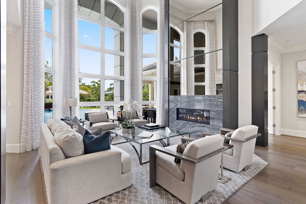 311 Fan Palm Road Home in Boca Raton, Florida. Discover contemporary elegance in this 5-bedroom golf course home at 311 Fan Palm Road, meticulously renovated to showcase brand new construction. Located in the esteemed Royal Palm Yacht & Country Club.