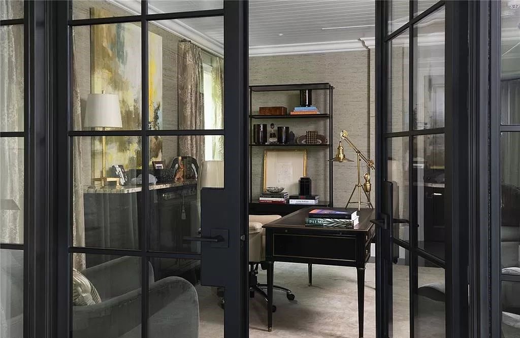 Nestled along Champney Bay in Naples, Florida, this meticulously renovated French West Indies-style estate, crafted by architect Jeff Harrell and updated by the esteemed Knauf-Koenig Group, offers a seamless blend of timeless elegance and modern luxury.