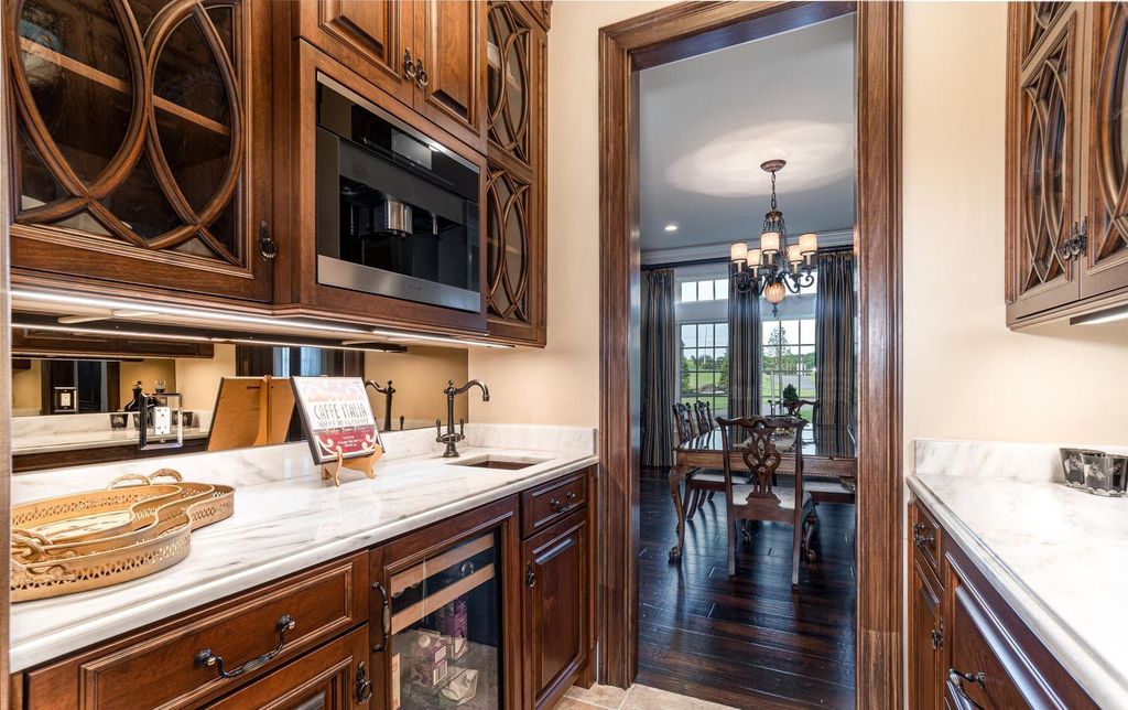 65 Brown Road Home in Stillwater, New York. Experience unparalleled luxury in this exquisite French Country Chateau nestled on 15 acres with stunning views of Saratoga Lake. Boasting 7,237 SF, this custom mansion features 5 bedroom suites, 7.5 baths, and a separate pool house with kitchenette, bathroom, and fireplace. 