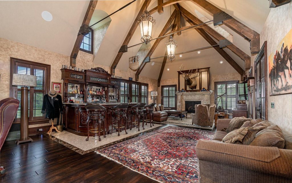 65 Brown Road Home in Stillwater, New York. Experience unparalleled luxury in this exquisite French Country Chateau nestled on 15 acres with stunning views of Saratoga Lake. Boasting 7,237 SF, this custom mansion features 5 bedroom suites, 7.5 baths, and a separate pool house with kitchenette, bathroom, and fireplace. 