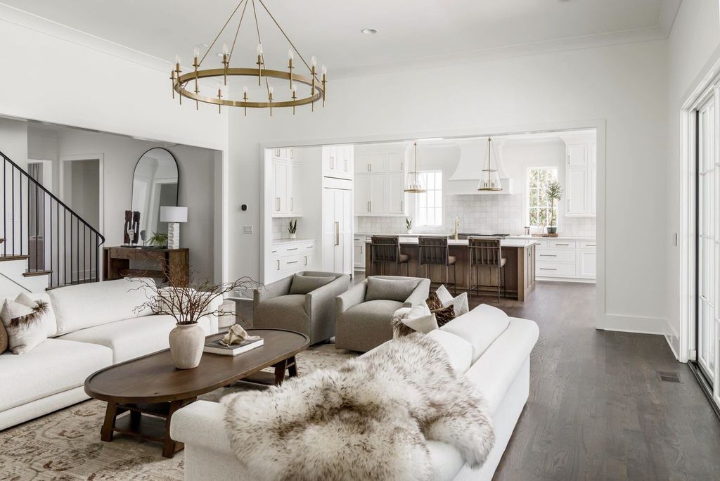 715 Greeley Drive Home in Nashville, Tennessee. Discover the epitome of refined luxury living in this meticulously crafted Southern Traditional home by Vintage South Development. Boasting 5 bedrooms, 5.5 bathrooms, and a wealth of functional spaces including a home gym and two rec rooms, this home seamlessly blends classic architecture with modern innovation. 