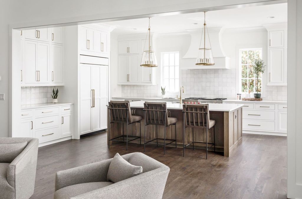 715 Greeley Drive Home in Nashville, Tennessee. Discover the epitome of refined luxury living in this meticulously crafted Southern Traditional home by Vintage South Development. Boasting 5 bedrooms, 5.5 bathrooms, and a wealth of functional spaces including a home gym and two rec rooms, this home seamlessly blends classic architecture with modern innovation. 