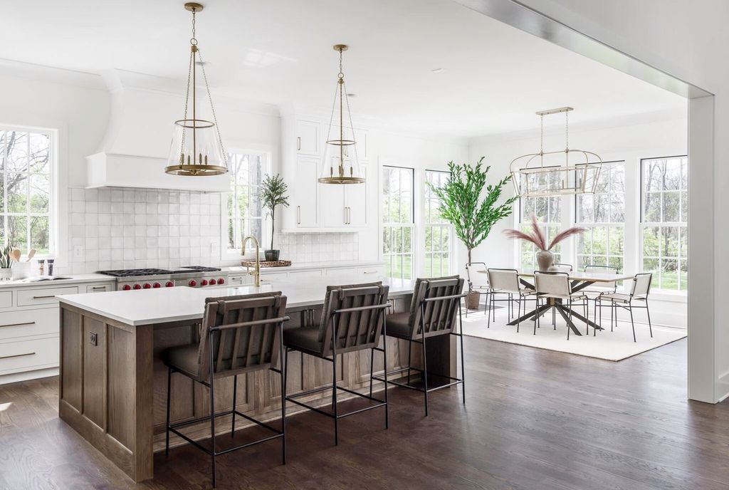 715 Greeley Drive Home in Nashville, Tennessee. Discover the epitome of refined luxury living in this meticulously crafted Southern Traditional home by Vintage South Development. Boasting 5 bedrooms, 5.5 bathrooms, and a wealth of functional spaces including a home gym and two rec rooms, this home seamlessly blends classic architecture with modern innovation. 