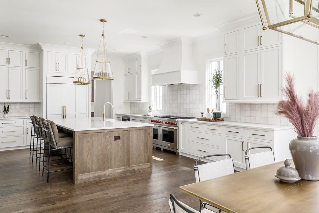 715 Greeley Drive Home in Nashville, Tennessee. Discover the epitome of refined luxury living in this meticulously crafted Southern Traditional home by Vintage South Development. Boasting 5 bedrooms, 5.5 bathrooms, and a wealth of functional spaces including a home gym and two rec rooms, this home seamlessly blends classic architecture with modern innovation. 