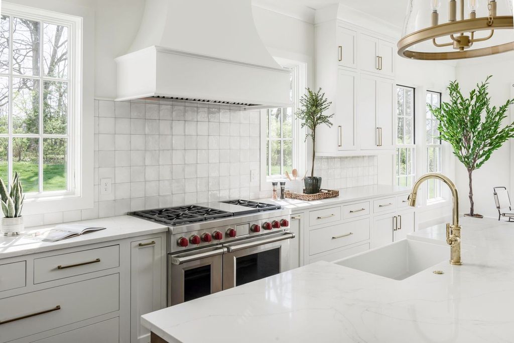 715 Greeley Drive Home in Nashville, Tennessee. Discover the epitome of refined luxury living in this meticulously crafted Southern Traditional home by Vintage South Development. Boasting 5 bedrooms, 5.5 bathrooms, and a wealth of functional spaces including a home gym and two rec rooms, this home seamlessly blends classic architecture with modern innovation. 