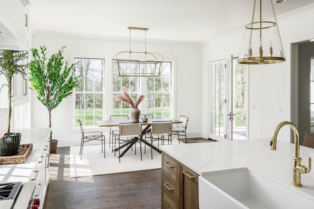 715 Greeley Drive Home in Nashville, Tennessee. Discover the epitome of refined luxury living in this meticulously crafted Southern Traditional home by Vintage South Development. Boasting 5 bedrooms, 5.5 bathrooms, and a wealth of functional spaces including a home gym and two rec rooms, this home seamlessly blends classic architecture with modern innovation. 