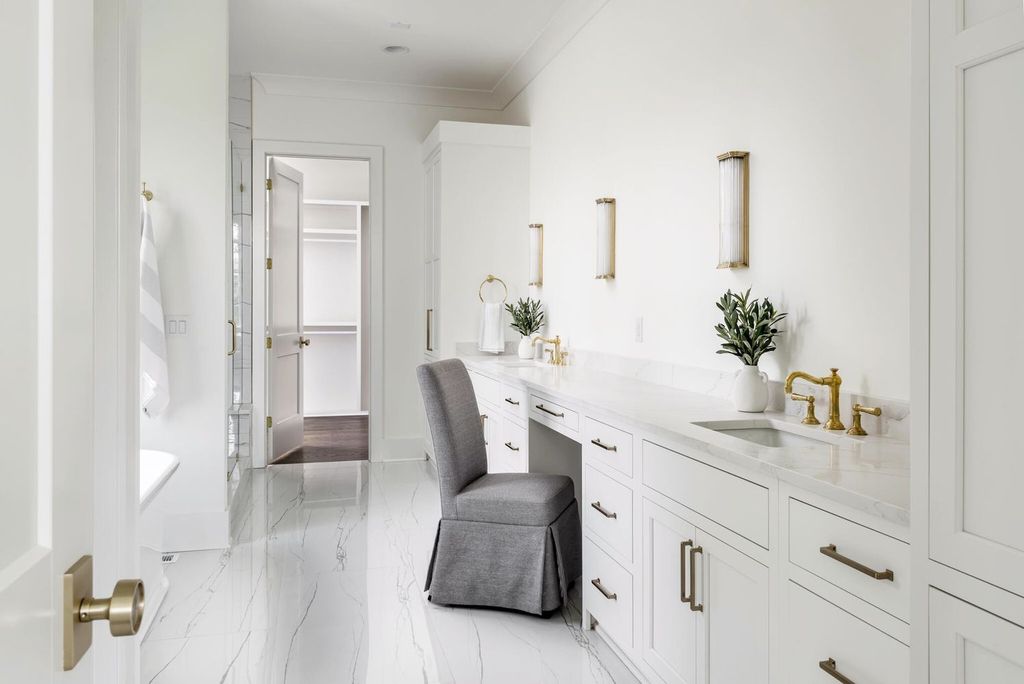 715 Greeley Drive Home in Nashville, Tennessee. Discover the epitome of refined luxury living in this meticulously crafted Southern Traditional home by Vintage South Development. Boasting 5 bedrooms, 5.5 bathrooms, and a wealth of functional spaces including a home gym and two rec rooms, this home seamlessly blends classic architecture with modern innovation. 