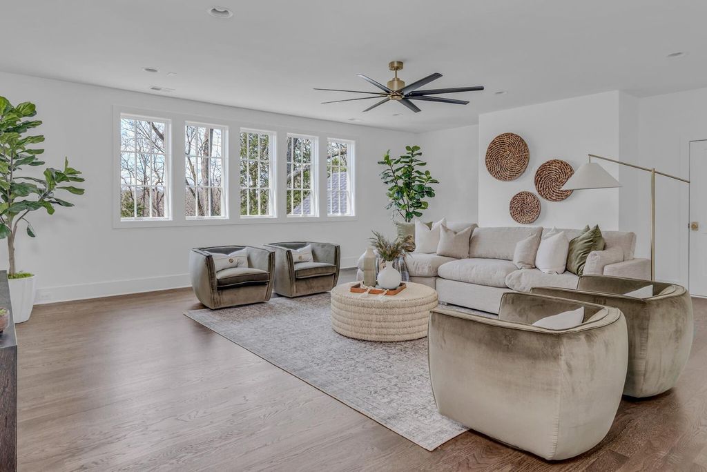 715 Greeley Drive Home in Nashville, Tennessee. Discover the epitome of refined luxury living in this meticulously crafted Southern Traditional home by Vintage South Development. Boasting 5 bedrooms, 5.5 bathrooms, and a wealth of functional spaces including a home gym and two rec rooms, this home seamlessly blends classic architecture with modern innovation. 