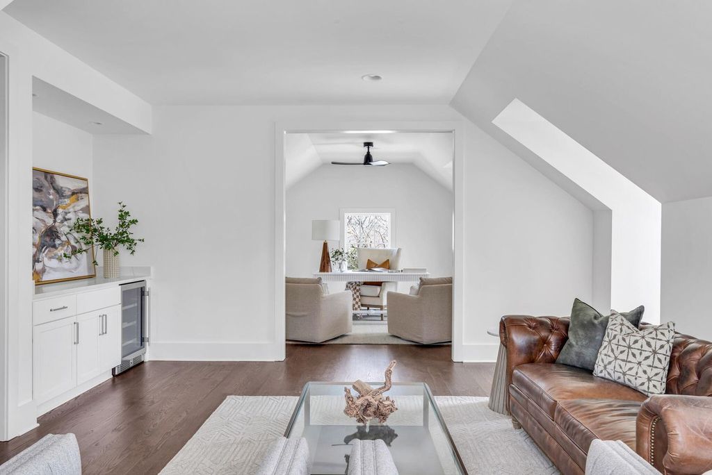 715 Greeley Drive Home in Nashville, Tennessee. Discover the epitome of refined luxury living in this meticulously crafted Southern Traditional home by Vintage South Development. Boasting 5 bedrooms, 5.5 bathrooms, and a wealth of functional spaces including a home gym and two rec rooms, this home seamlessly blends classic architecture with modern innovation. 