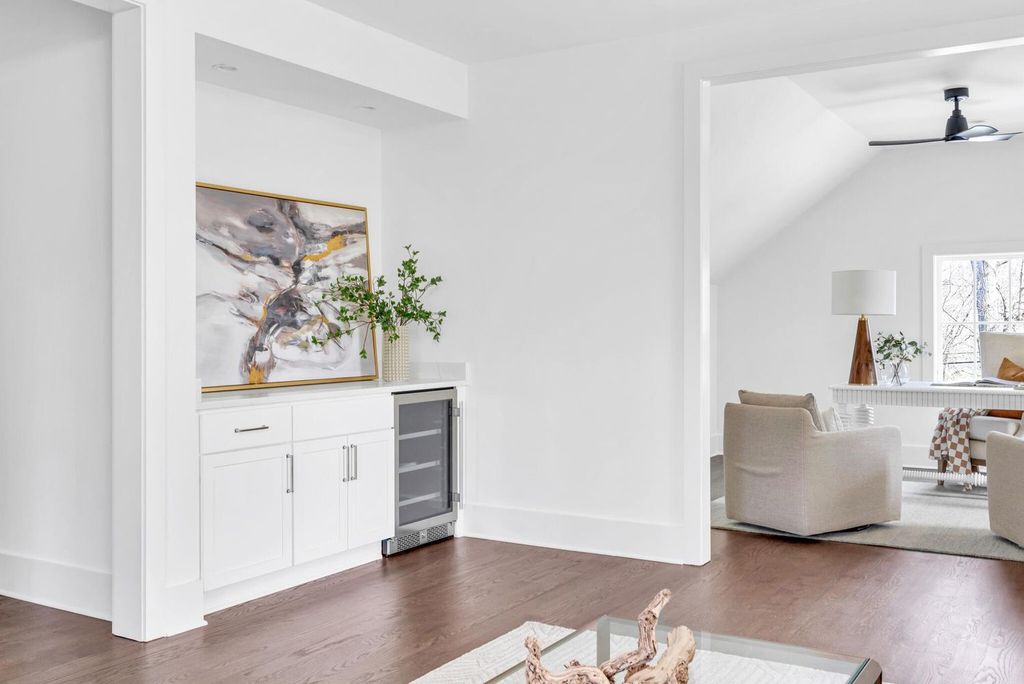 715 Greeley Drive Home in Nashville, Tennessee. Discover the epitome of refined luxury living in this meticulously crafted Southern Traditional home by Vintage South Development. Boasting 5 bedrooms, 5.5 bathrooms, and a wealth of functional spaces including a home gym and two rec rooms, this home seamlessly blends classic architecture with modern innovation. 