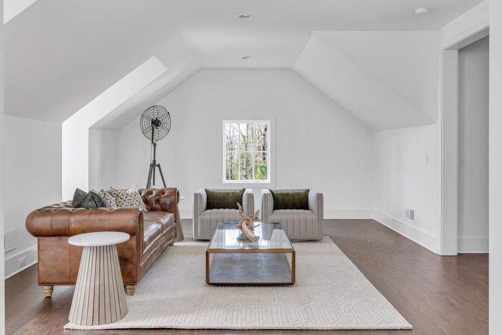 715 Greeley Drive Home in Nashville, Tennessee. Discover the epitome of refined luxury living in this meticulously crafted Southern Traditional home by Vintage South Development. Boasting 5 bedrooms, 5.5 bathrooms, and a wealth of functional spaces including a home gym and two rec rooms, this home seamlessly blends classic architecture with modern innovation. 