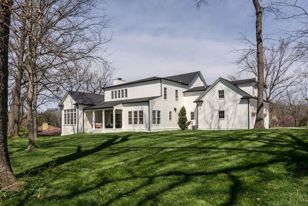 715 Greeley Drive Home in Nashville, Tennessee. Discover the epitome of refined luxury living in this meticulously crafted Southern Traditional home by Vintage South Development. Boasting 5 bedrooms, 5.5 bathrooms, and a wealth of functional spaces including a home gym and two rec rooms, this home seamlessly blends classic architecture with modern innovation. 