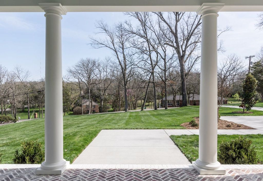 715 Greeley Drive Home in Nashville, Tennessee. Discover the epitome of refined luxury living in this meticulously crafted Southern Traditional home by Vintage South Development. Boasting 5 bedrooms, 5.5 bathrooms, and a wealth of functional spaces including a home gym and two rec rooms, this home seamlessly blends classic architecture with modern innovation. 