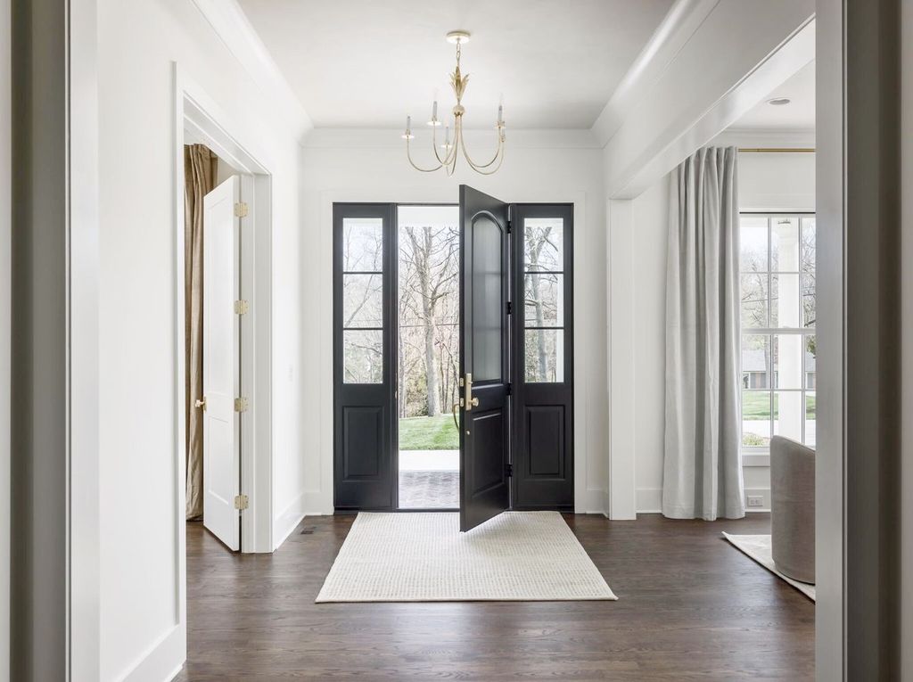 715 Greeley Drive Home in Nashville, Tennessee. Discover the epitome of refined luxury living in this meticulously crafted Southern Traditional home by Vintage South Development. Boasting 5 bedrooms, 5.5 bathrooms, and a wealth of functional spaces including a home gym and two rec rooms, this home seamlessly blends classic architecture with modern innovation. 