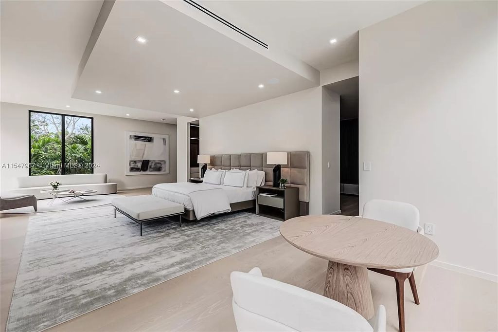 Discover The Grove on Park Oaks, a luxurious haven in Miami's sought-after Coconut Grove neighborhood. With over 14,000 square feet of living and entertainment space, this residence epitomizes modern elegance and comfort.