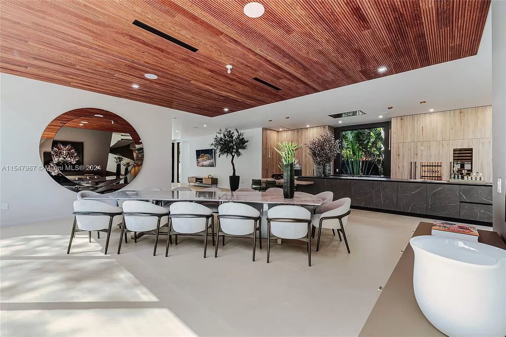 Discover The Grove on Park Oaks, a luxurious haven in Miami's sought-after Coconut Grove neighborhood. With over 14,000 square feet of living and entertainment space, this residence epitomizes modern elegance and comfort.