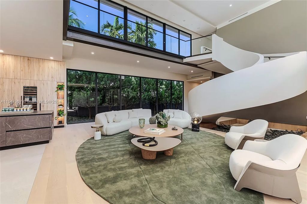 Discover The Grove on Park Oaks, a luxurious haven in Miami's sought-after Coconut Grove neighborhood. With over 14,000 square feet of living and entertainment space, this residence epitomizes modern elegance and comfort.