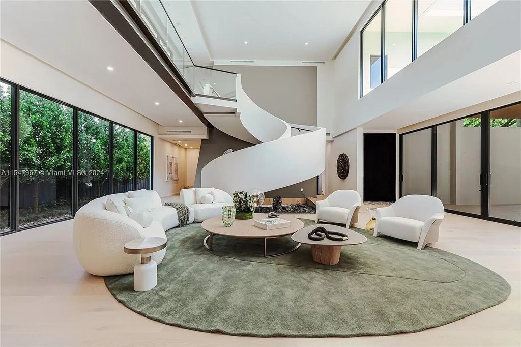 Discover The Grove on Park Oaks, a luxurious haven in Miami's sought-after Coconut Grove neighborhood. With over 14,000 square feet of living and entertainment space, this residence epitomizes modern elegance and comfort.