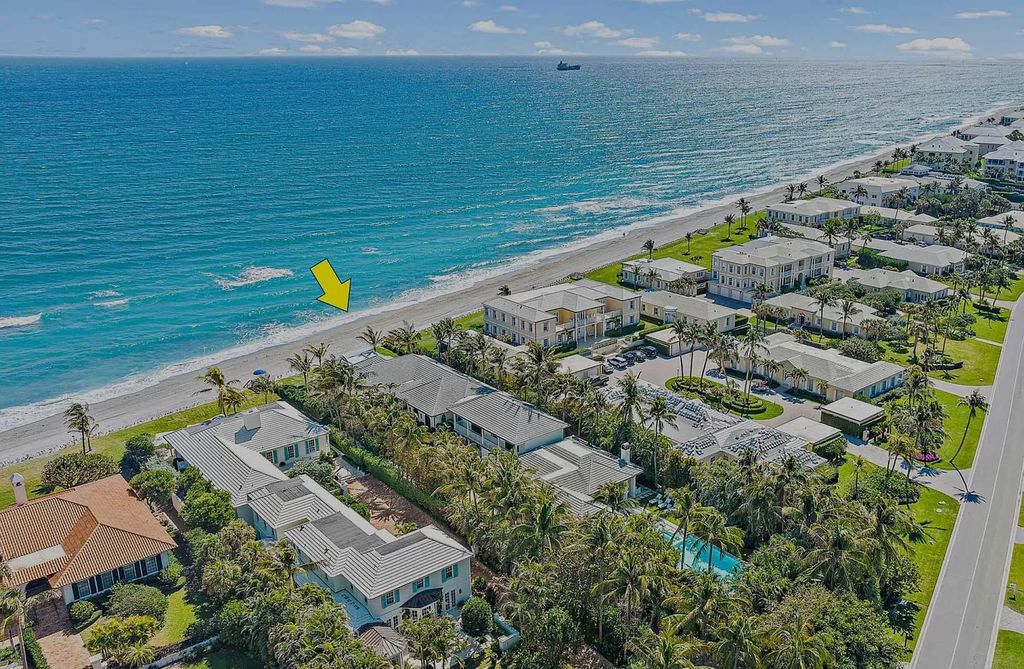 Welcome to 11432 Turtle Beach Road, an exquisite oceanfront property in North Palm Beach, FL, offering 7 bedrooms, 7 bathrooms, and 7,823 square feet of luxury living space on a sprawling 0.80-acre lot. This meticulously renovated home seamlessly blends elegance with casual beach living, featuring separate guest and living quarters that capture both east and west exposures, inviting ocean breezes, and abundant natural light
