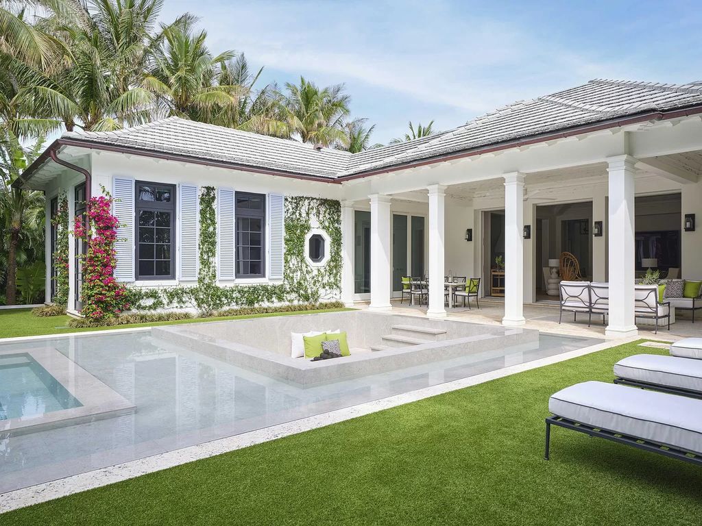 Welcome to 11432 Turtle Beach Road, an exquisite oceanfront property in North Palm Beach, FL, offering 7 bedrooms, 7 bathrooms, and 7,823 square feet of luxury living space on a sprawling 0.80-acre lot. This meticulously renovated home seamlessly blends elegance with casual beach living, featuring separate guest and living quarters that capture both east and west exposures, inviting ocean breezes, and abundant natural light