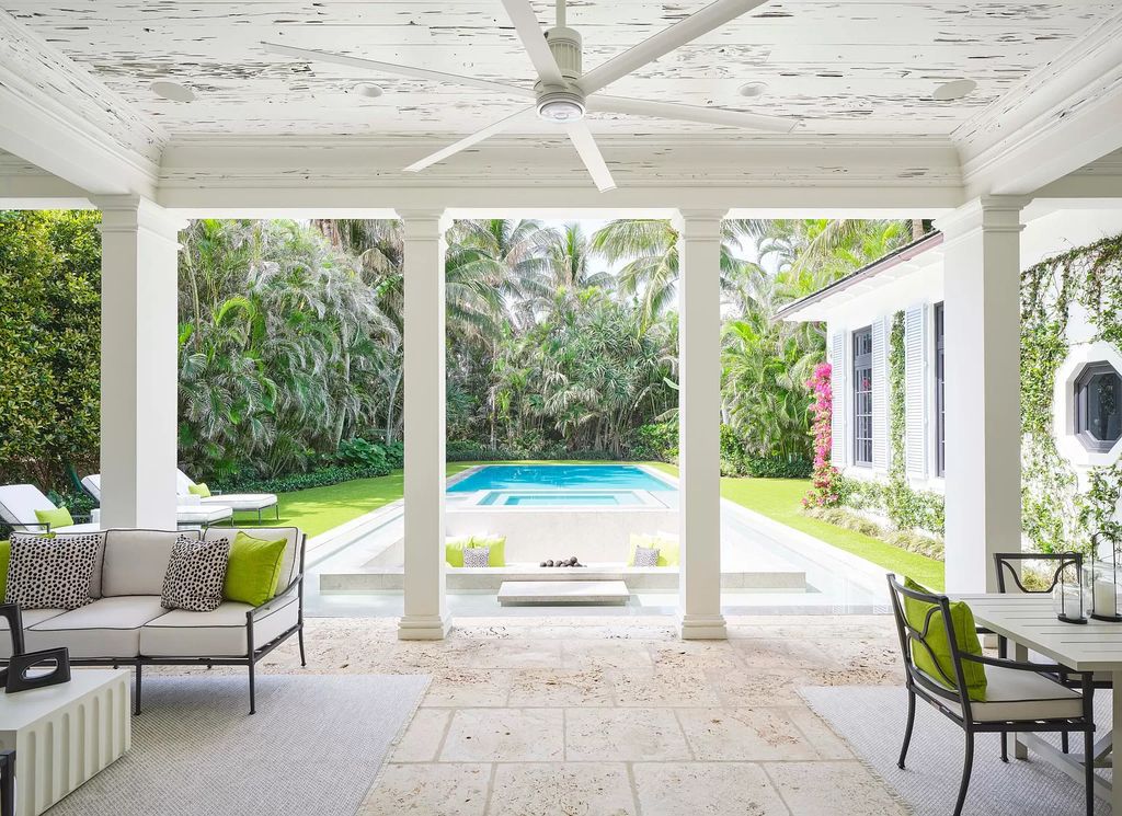 Welcome to 11432 Turtle Beach Road, an exquisite oceanfront property in North Palm Beach, FL, offering 7 bedrooms, 7 bathrooms, and 7,823 square feet of luxury living space on a sprawling 0.80-acre lot. This meticulously renovated home seamlessly blends elegance with casual beach living, featuring separate guest and living quarters that capture both east and west exposures, inviting ocean breezes, and abundant natural light