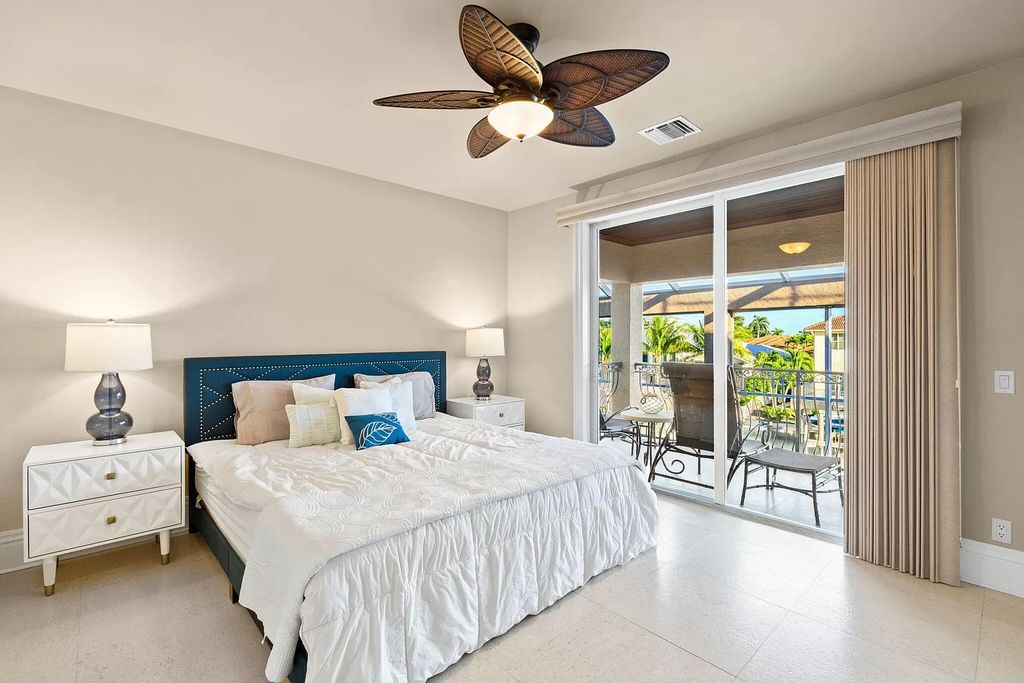 Experience unparalleled luxury living at this waterfront estate in Tigertail/Collier Bay, Marco Island. Boasting over $400,000 in price reduction, this multi-level home features a private elevator, 6 bedrooms, 7 bathrooms, 2 living rooms, a den, and a formal dining room, spanning just over 6,500 square feet of living space.
