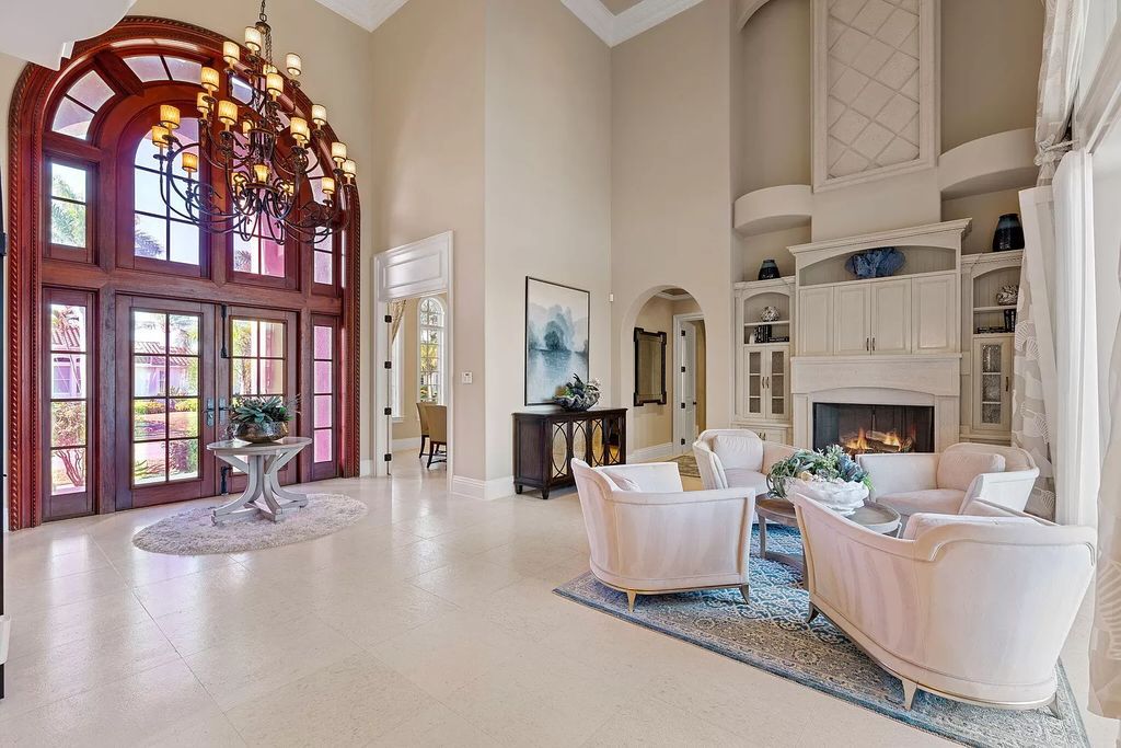 Experience unparalleled luxury living at this waterfront estate in Tigertail/Collier Bay, Marco Island. Boasting over $400,000 in price reduction, this multi-level home features a private elevator, 6 bedrooms, 7 bathrooms, 2 living rooms, a den, and a formal dining room, spanning just over 6,500 square feet of living space.