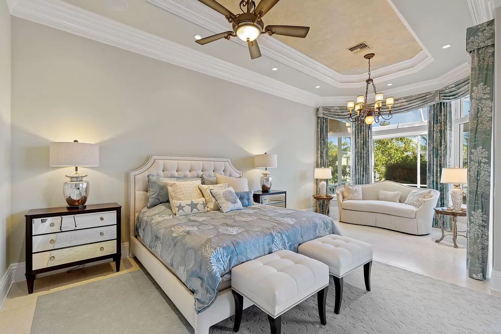 Experience unparalleled luxury living at this waterfront estate in Tigertail/Collier Bay, Marco Island. Boasting over $400,000 in price reduction, this multi-level home features a private elevator, 6 bedrooms, 7 bathrooms, 2 living rooms, a den, and a formal dining room, spanning just over 6,500 square feet of living space.