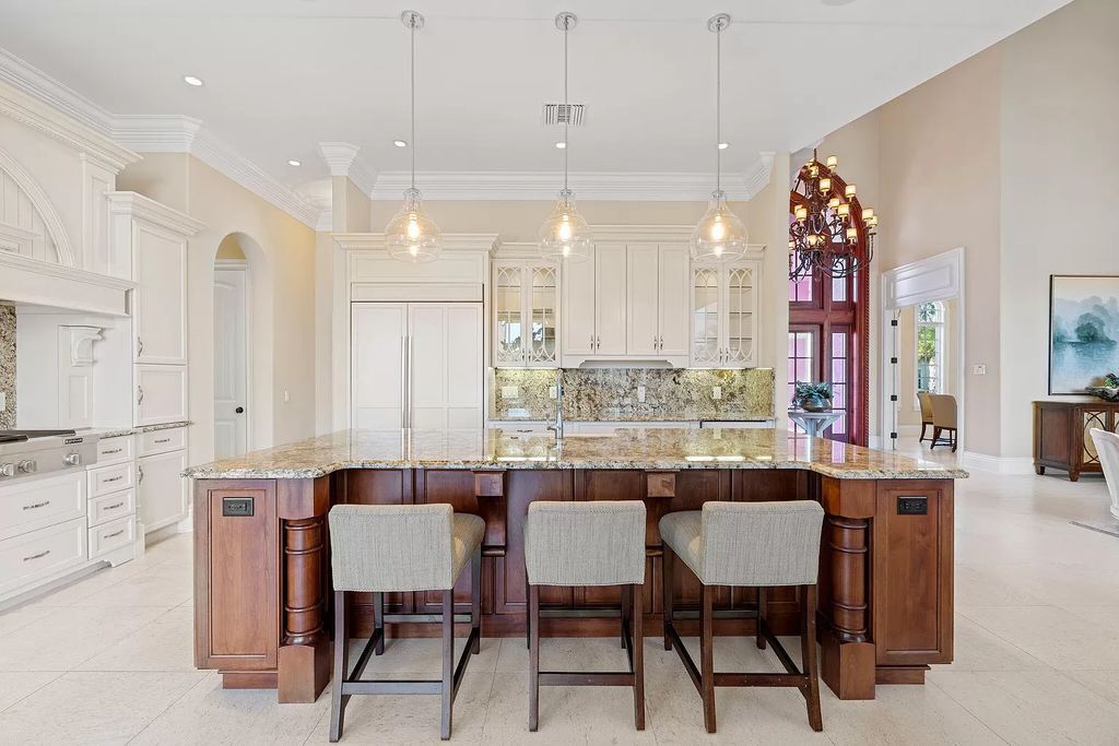 Experience unparalleled luxury living at this waterfront estate in Tigertail/Collier Bay, Marco Island. Boasting over $400,000 in price reduction, this multi-level home features a private elevator, 6 bedrooms, 7 bathrooms, 2 living rooms, a den, and a formal dining room, spanning just over 6,500 square feet of living space.