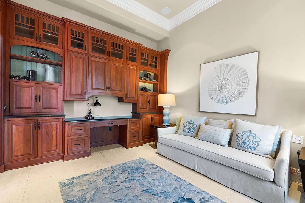 Experience unparalleled luxury living at this waterfront estate in Tigertail/Collier Bay, Marco Island. Boasting over $400,000 in price reduction, this multi-level home features a private elevator, 6 bedrooms, 7 bathrooms, 2 living rooms, a den, and a formal dining room, spanning just over 6,500 square feet of living space.