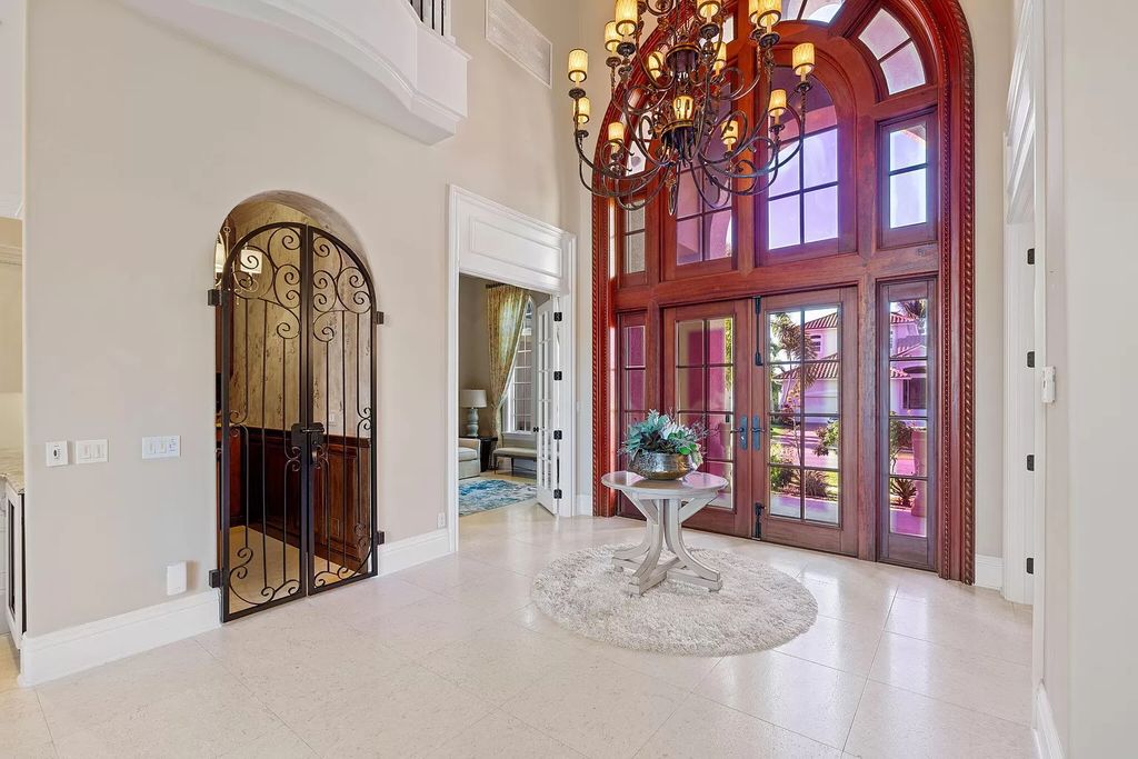 Experience unparalleled luxury living at this waterfront estate in Tigertail/Collier Bay, Marco Island. Boasting over $400,000 in price reduction, this multi-level home features a private elevator, 6 bedrooms, 7 bathrooms, 2 living rooms, a den, and a formal dining room, spanning just over 6,500 square feet of living space.