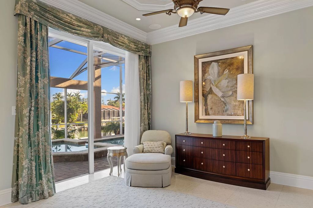 Experience unparalleled luxury living at this waterfront estate in Tigertail/Collier Bay, Marco Island. Boasting over $400,000 in price reduction, this multi-level home features a private elevator, 6 bedrooms, 7 bathrooms, 2 living rooms, a den, and a formal dining room, spanning just over 6,500 square feet of living space.