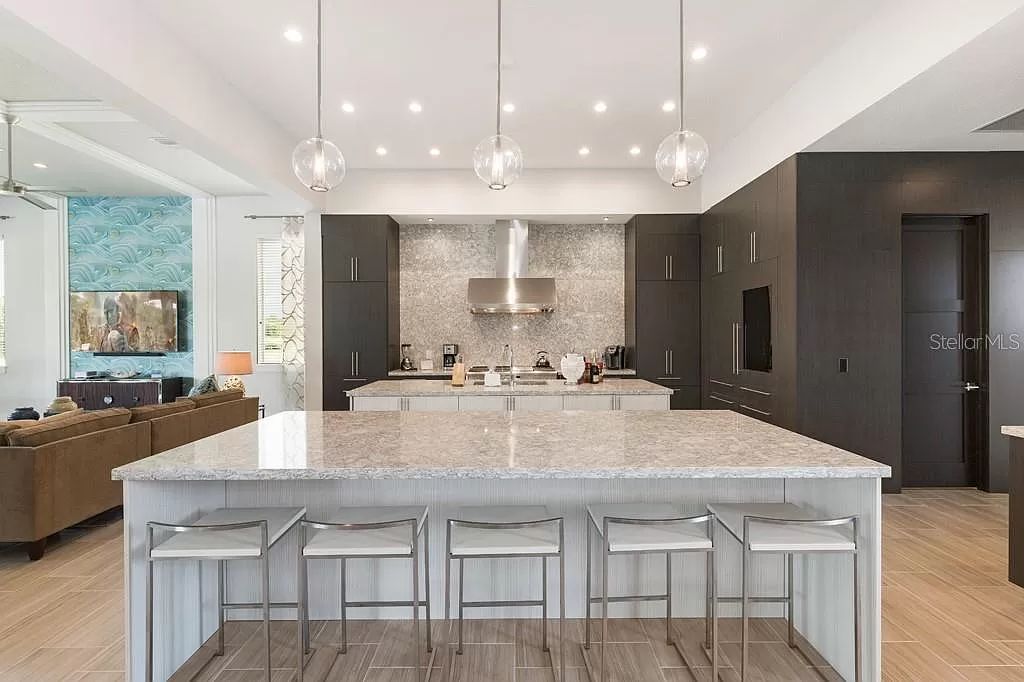 Welcome to Kempa Park, a luxurious 12-bedroom, 16-bathroom vacation retreat situated on the 6th hole of the Jack Nicklaus-designed golf course at Reunion Resort and Club.