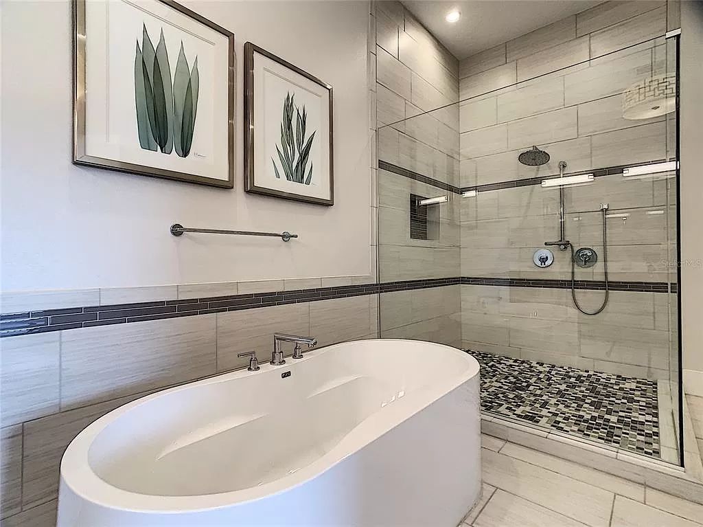Welcome to Kempa Park, a luxurious 12-bedroom, 16-bathroom vacation retreat situated on the 6th hole of the Jack Nicklaus-designed golf course at Reunion Resort and Club.